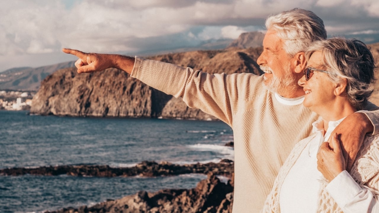 Elderly couple, retire, man, woman, vacation, beach, ocean