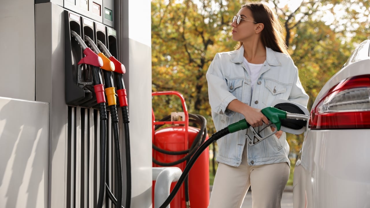 Woman, gas pump, fill, tank, fuel, car, nozzle