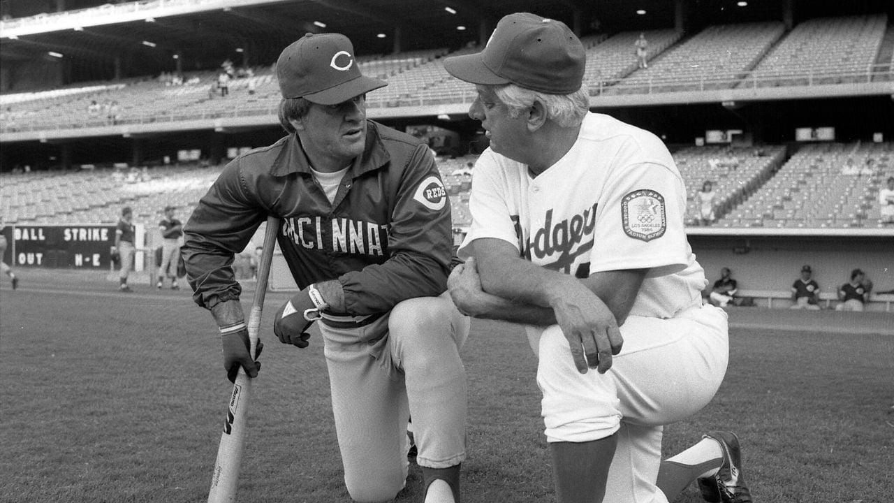 Tommy Lasorda talking with Cincinnati's Pete Rose before game in Los Angeles.