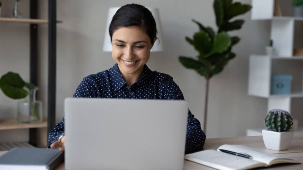 smiling woman working from home